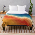 Plush blanket with vibrant geometric abstract pattern