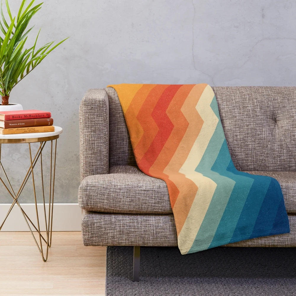 Plush blanket with vibrant geometric abstract pattern