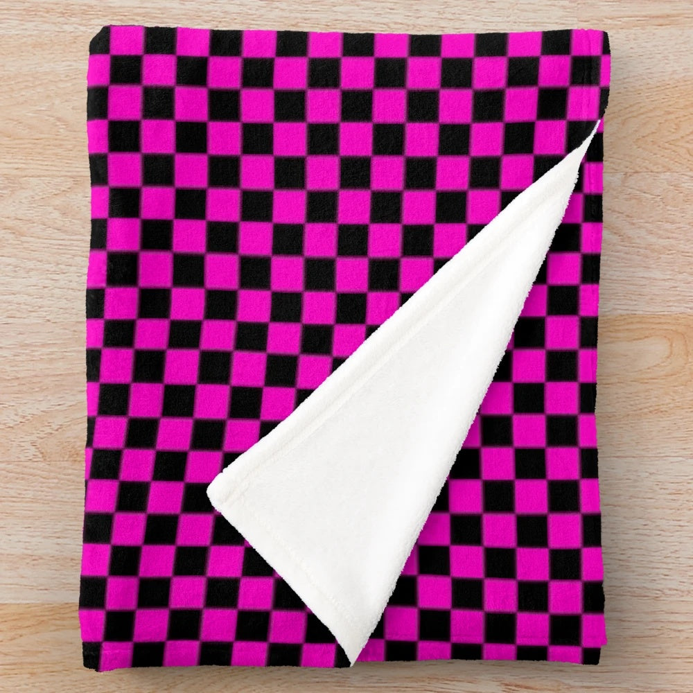 Vibrant geometric patterned plush blanket with abstract "missing texture" design