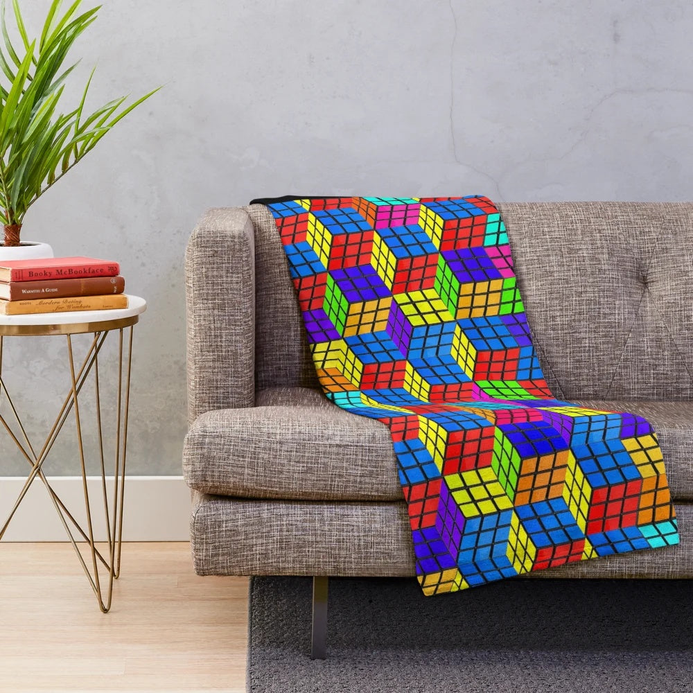 Vibrant geometric plush blanket with optical illusion design