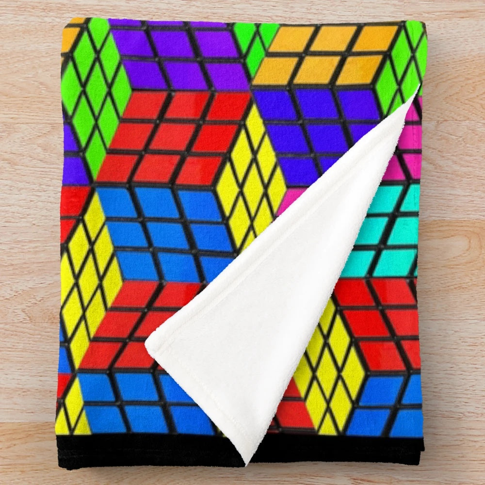 Vibrant geometric plush blanket with optical illusion design