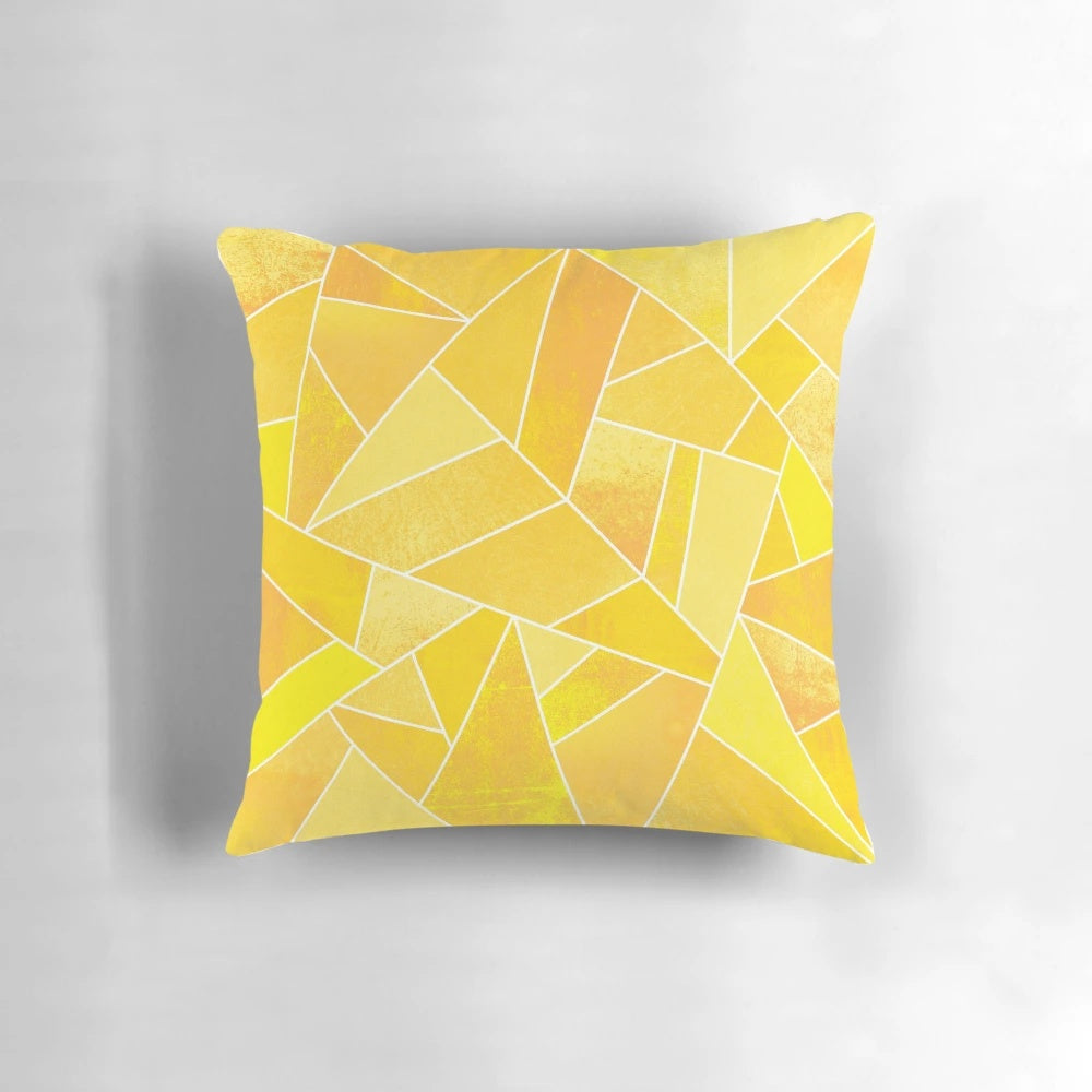Bright yellow geometric pattern throw pillow with abstract mosaic design