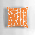 Vibrant orange throw pillow with abstract geometric shapes, inspired by mid-century modern and Scandinavian design.