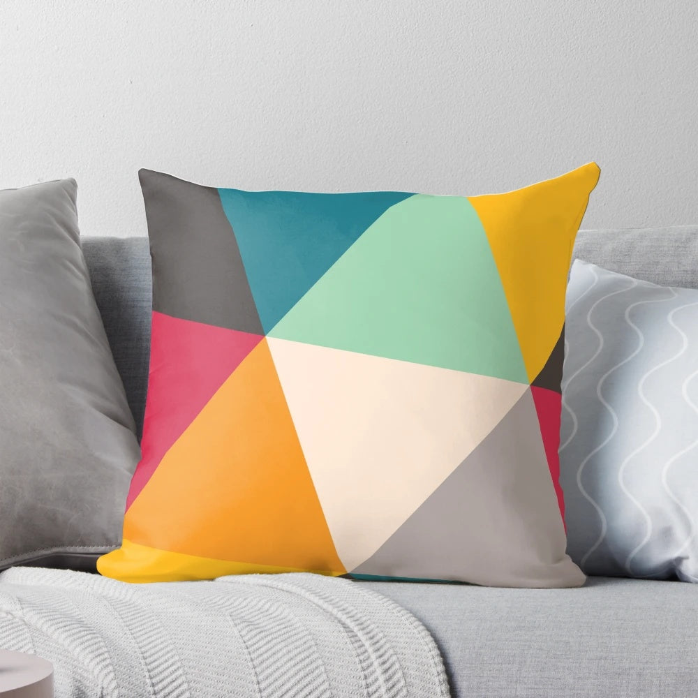 Colorful abstract geometric triangles design on a modern throw pillow