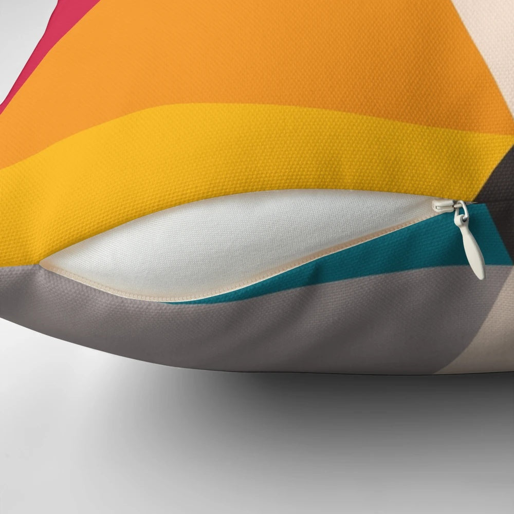 Colorful abstract geometric triangles design on a modern throw pillow