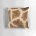 Giraffe-patterned decorative pillow with vibrant colors and African wildlife design