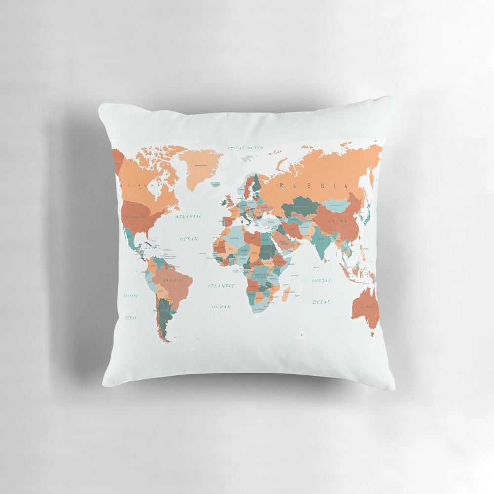 Decorative pillow featuring a vibrant world map design in burnt orange and teal colors