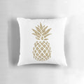 A plush, decorative pillow featuring a gold glittering pineapple design in a watercolor-inspired, colorful splash pattern.