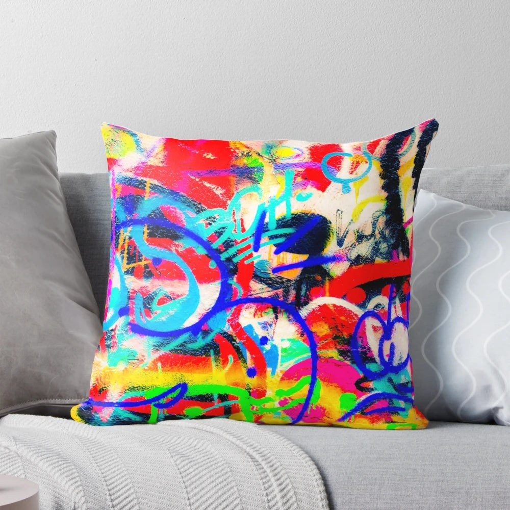 Colorful abstract graffiti-style pillow with modern, urban wall art design