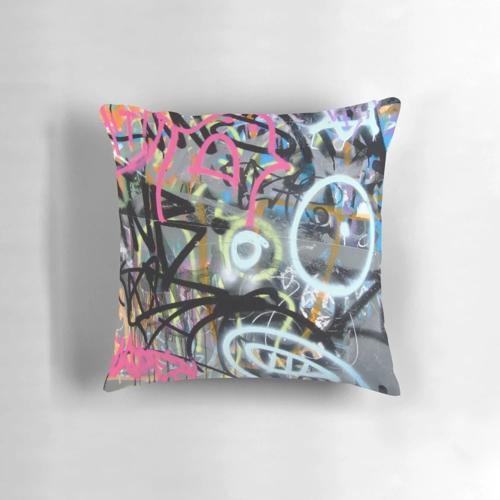 Colorful graffiti-patterned throw pillow for modern, urban-inspired home decor