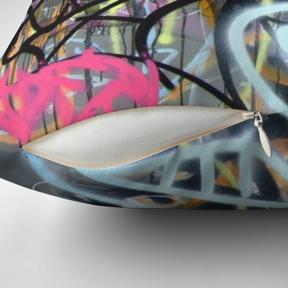 Colorful graffiti-patterned throw pillow for modern, urban-inspired home decor