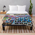 Graffiti-style plush blanket featuring a cinema building design