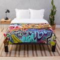 Colorful graffiti-inspired plush blanket