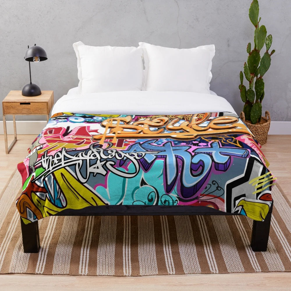 Colorful graffiti-inspired plush blanket
