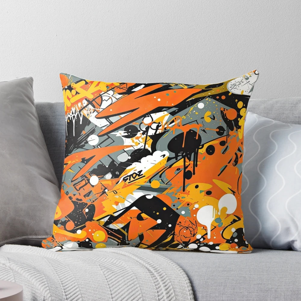Stylish pillow featuring a seamless pattern with urban graffiti-inspired designs in vibrant orange, black, and grey tones.