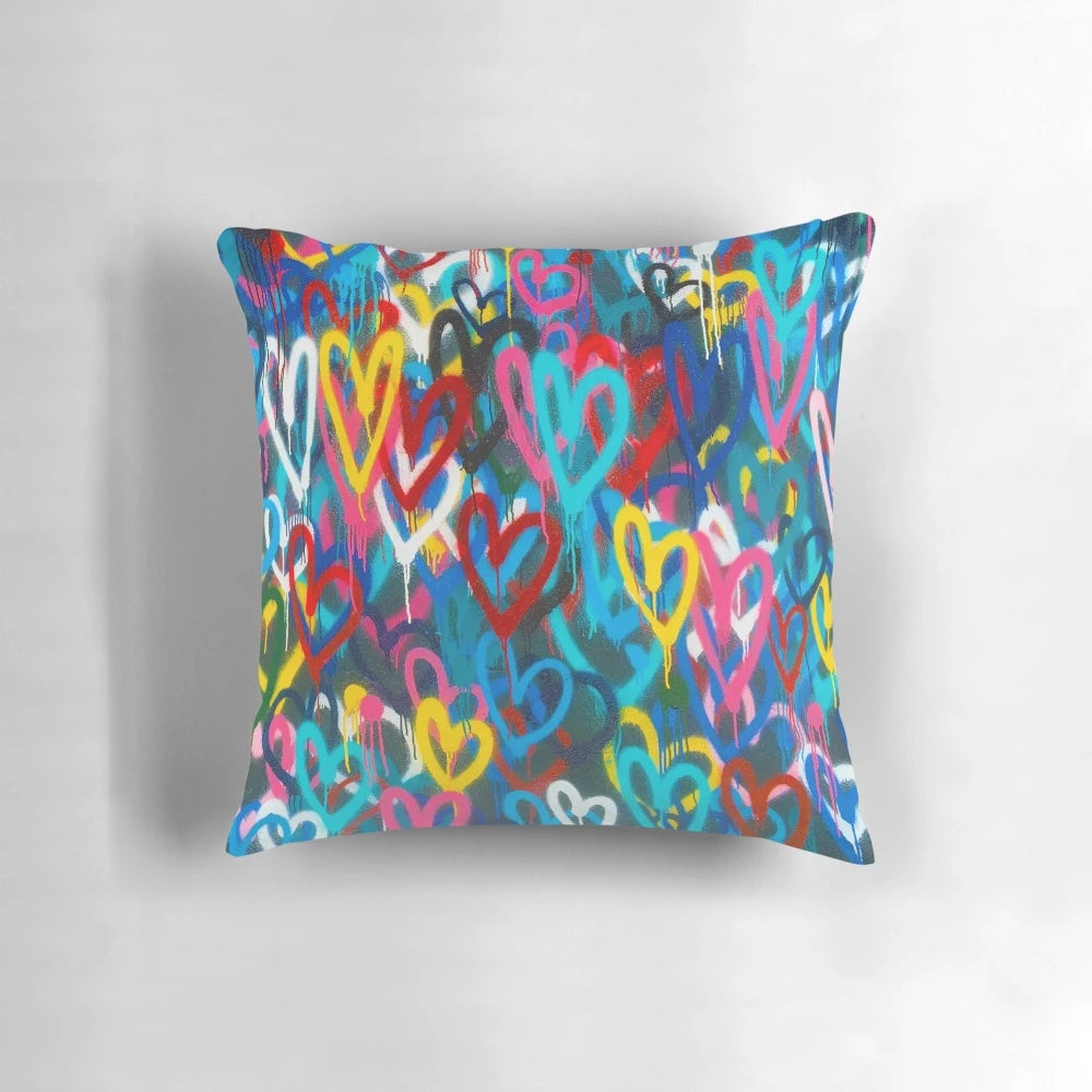 Colorful graffiti-style painting on a throw pillow with a grungy, urban aesthetic.
