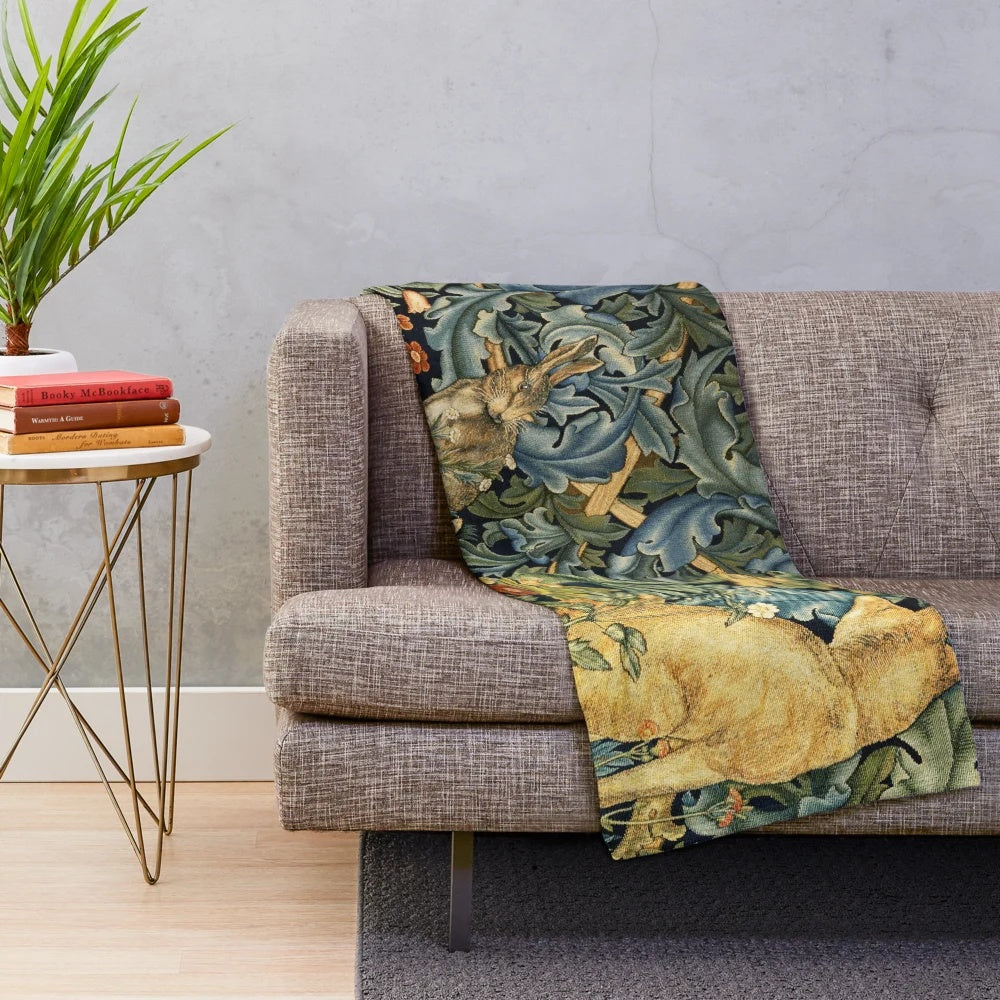 Colorful floral plush blanket with whimsical forest animals like a fox and hare