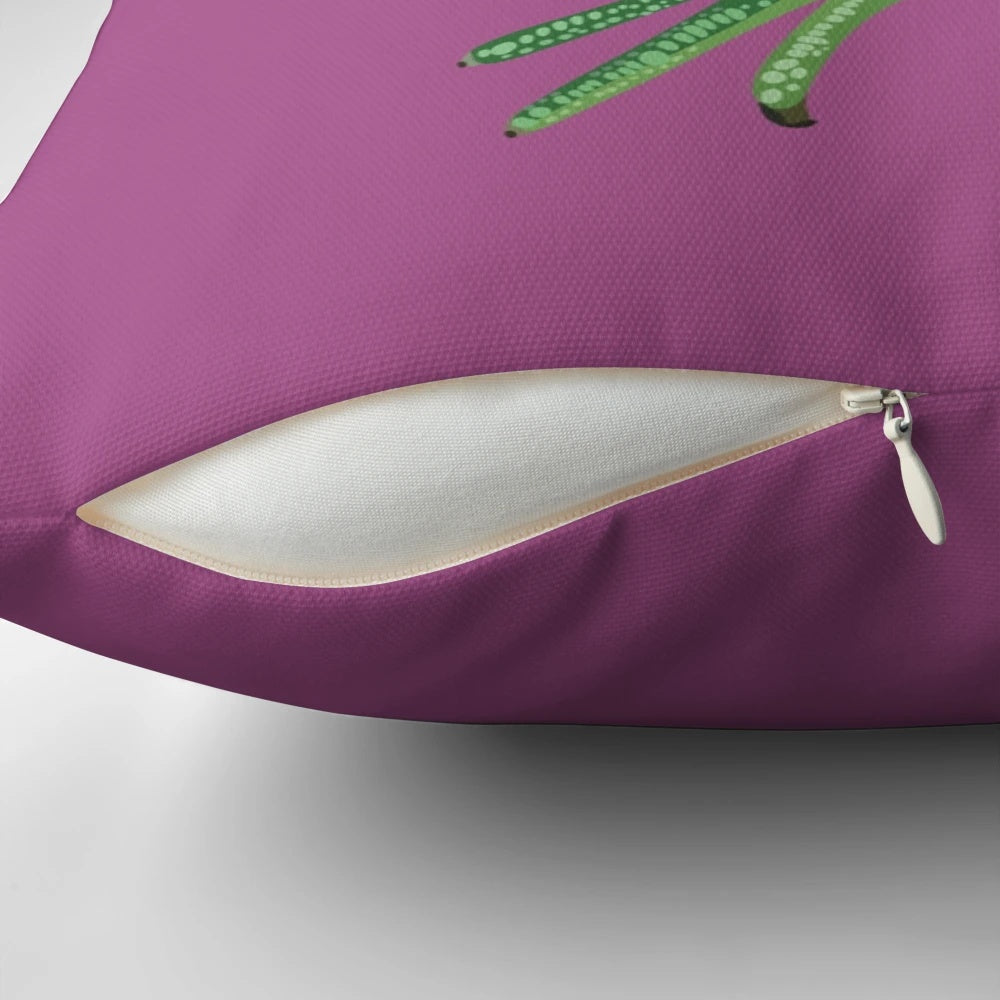 Colorful green iguana illustration on a decorative throw pillow