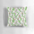 Decorative throw pillow featuring a vibrant green quaker monk parakeet bird pattern.