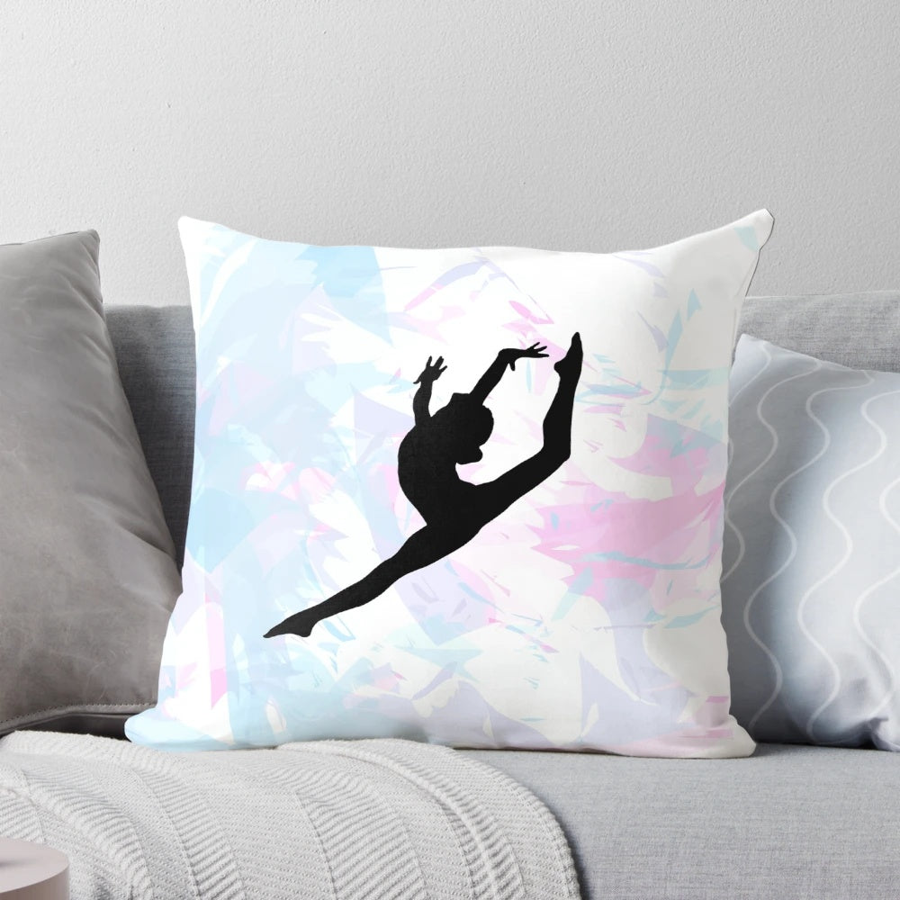 A colorful water color-style gymnastics silhouette printed on a soft throw pillow.