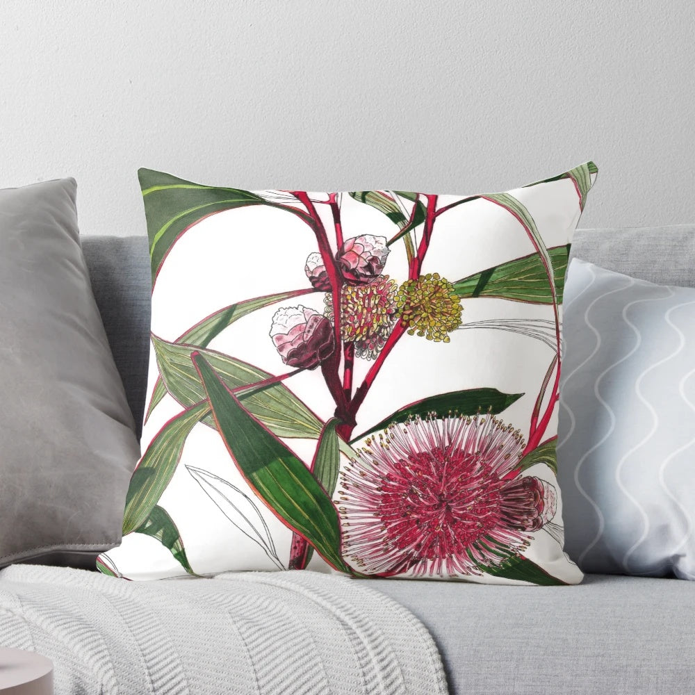Pillow featuring a watercolor illustration of pink and green hakea flowers, a native Australian plant