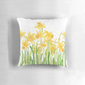 Colorful hand painted daffodil flowers in a meadow watercolor design on a square throw pillow.