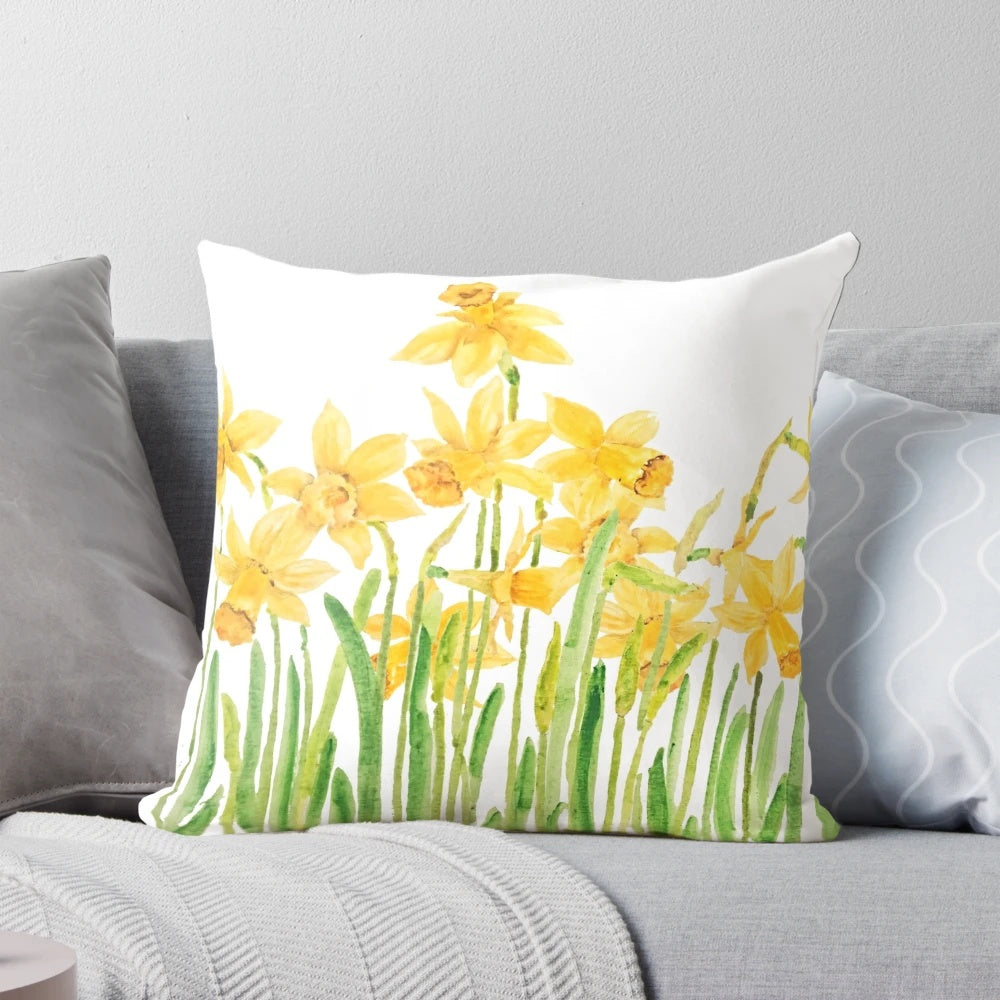 Colorful hand painted daffodil flowers in a meadow watercolor design on a square throw pillow.