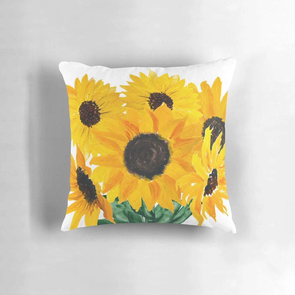 Colorful handmade throw pillow featuring a painted sunflower bouquet design in shades of yellow and green.