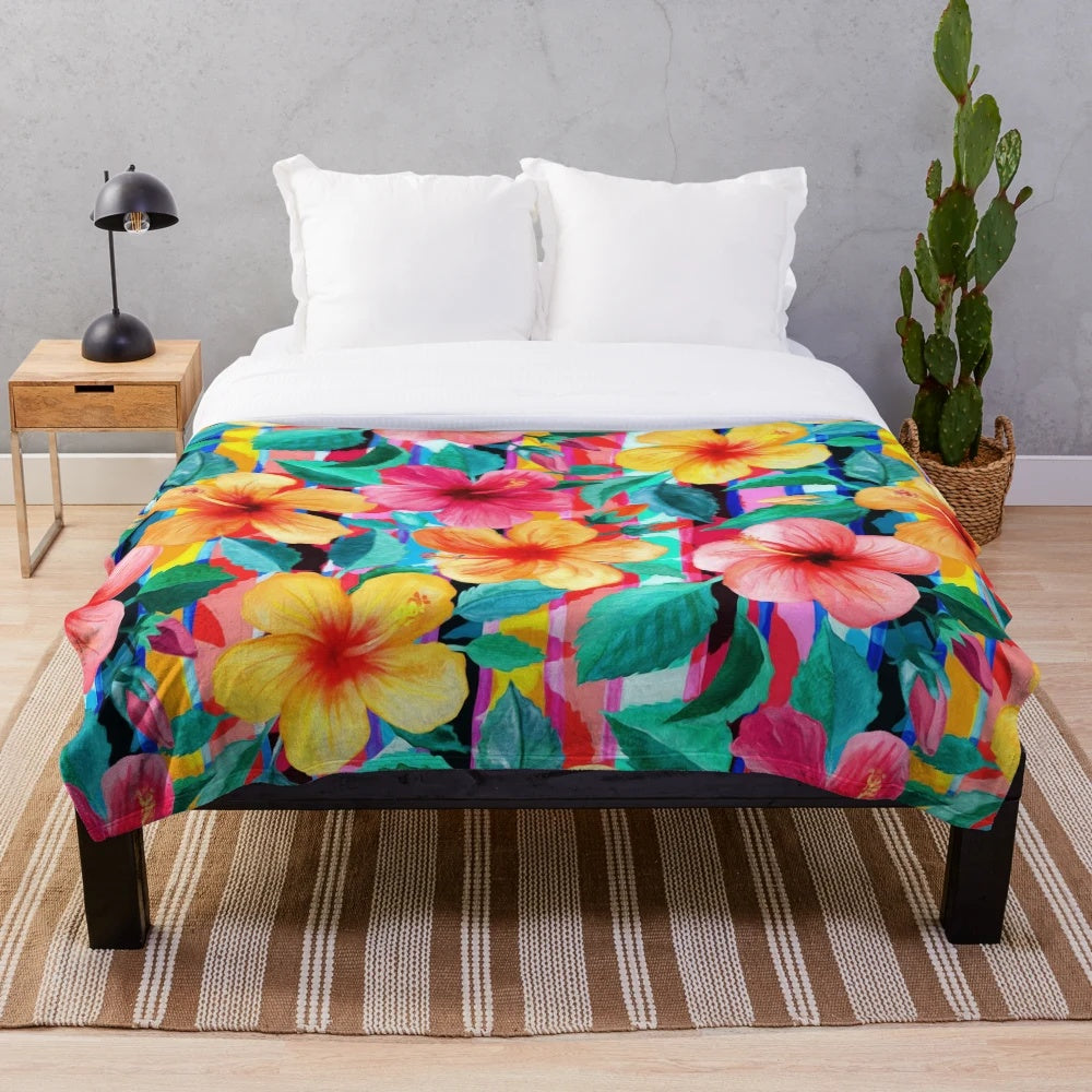 Colorful Hawaiian hibiscus floral pattern plush blanket with bright tropical stripes