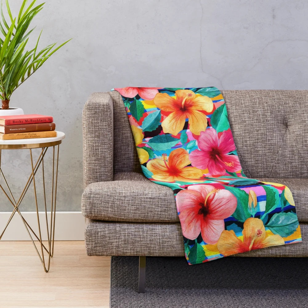 Colorful Hawaiian hibiscus floral pattern plush blanket with bright tropical stripes