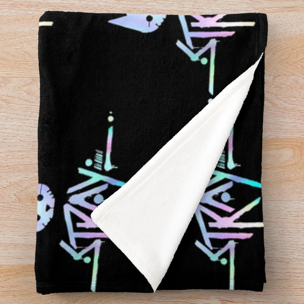 Holographic iridescent plush blanket featuring the iconic Stray game logo in a pastel color palette