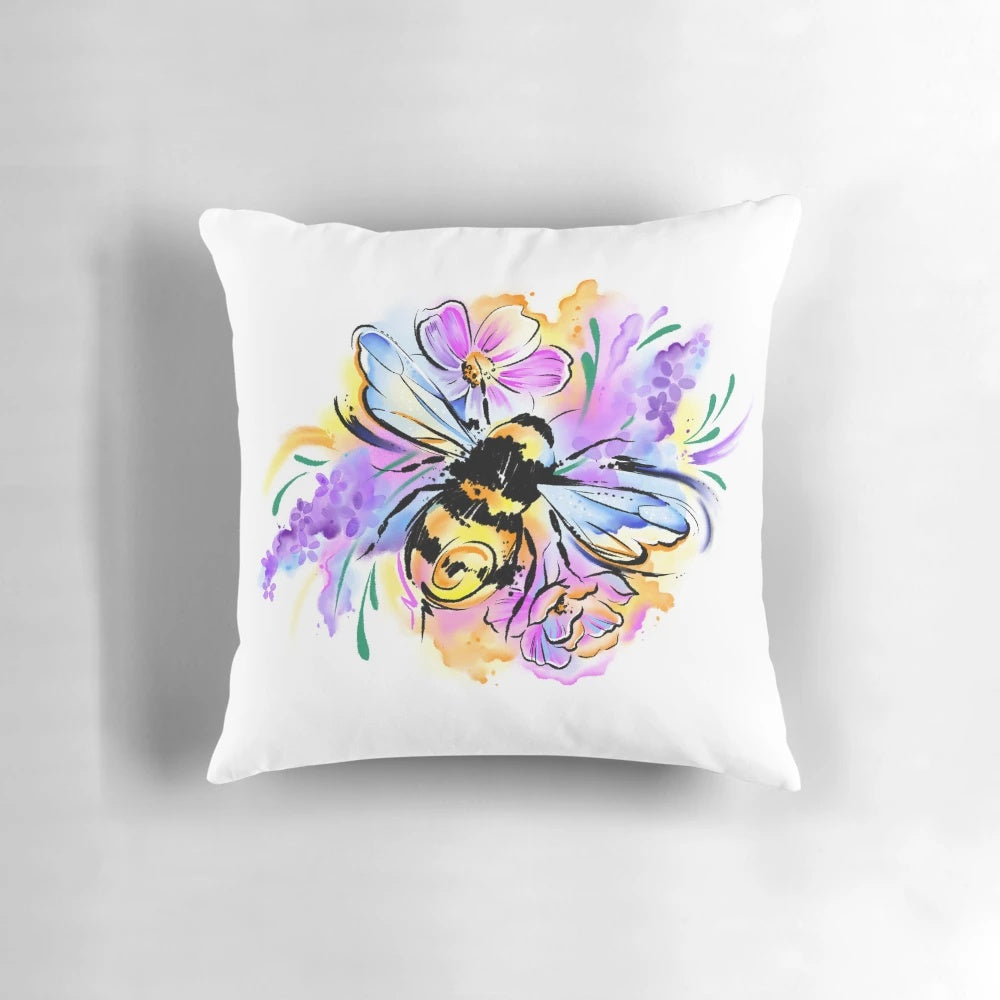 A Pillow featuring a detailed illustration of a honeybee surrounded by lavender and abstract floral patterns in shades of pink and purple.