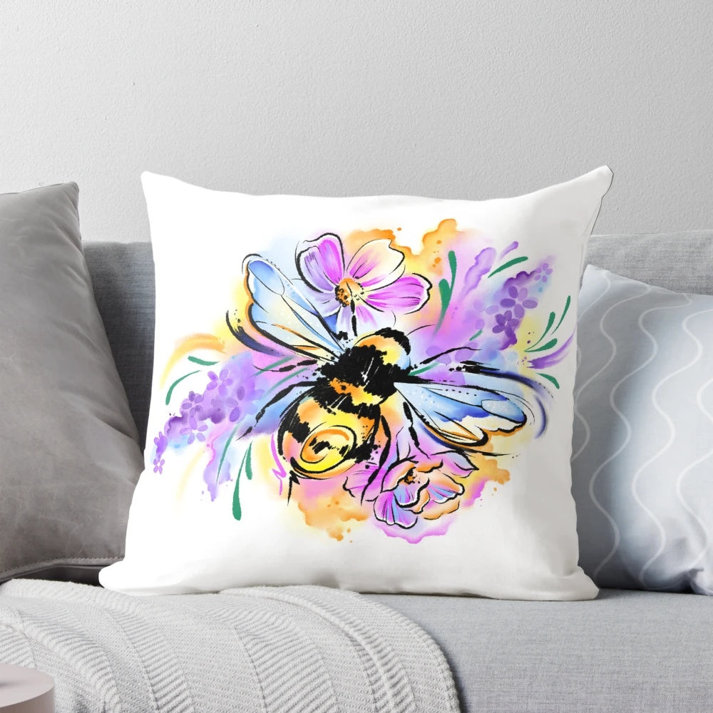 A Pillow featuring a detailed illustration of a honeybee surrounded by lavender and abstract floral patterns in shades of pink and purple.