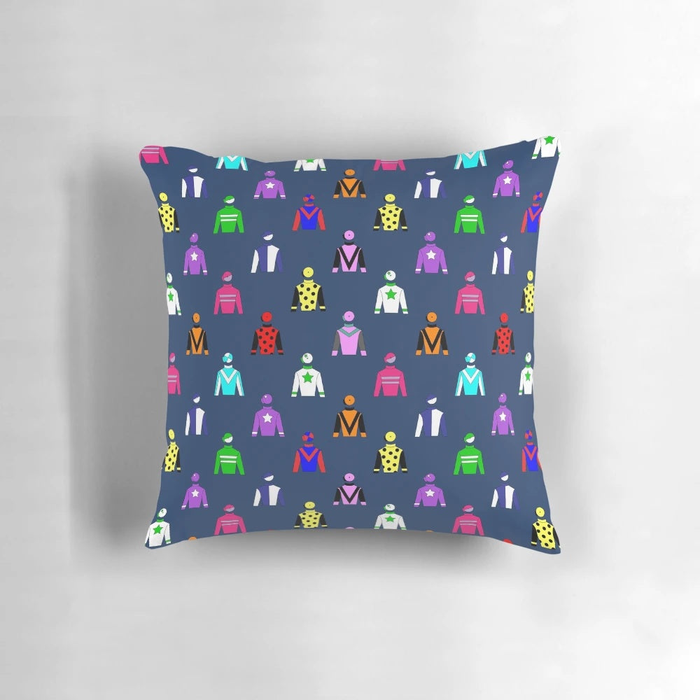 Colorful horse racing jockey silks pattern on a navy blue throw pillow