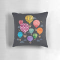 Cozy decorative pillow featuring a hand-painted hot air balloon design against a night sky backdrop.