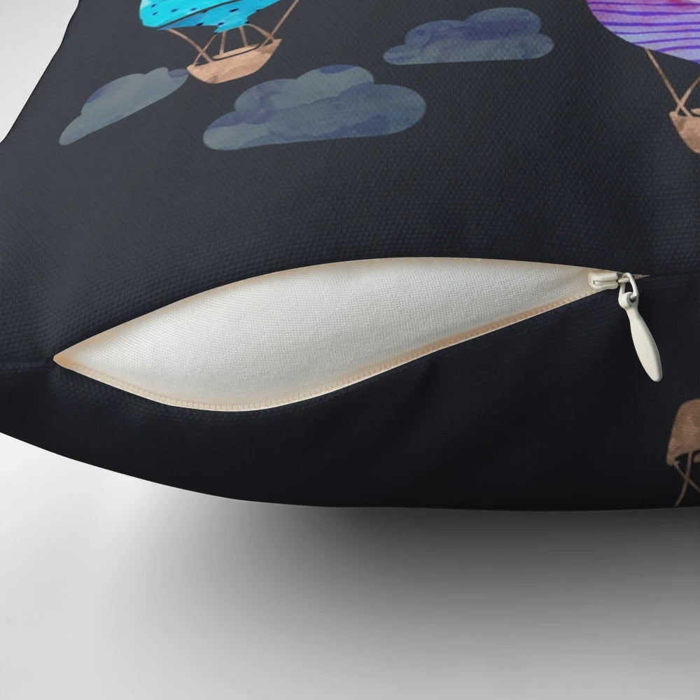Cozy decorative pillow featuring a hand-painted hot air balloon design against a night sky backdrop.