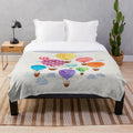 Colorful hot air balloon plush blanket with hand-painted watercolor design