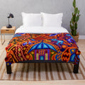 Colorful plush blanket with traditional Huichol textile design