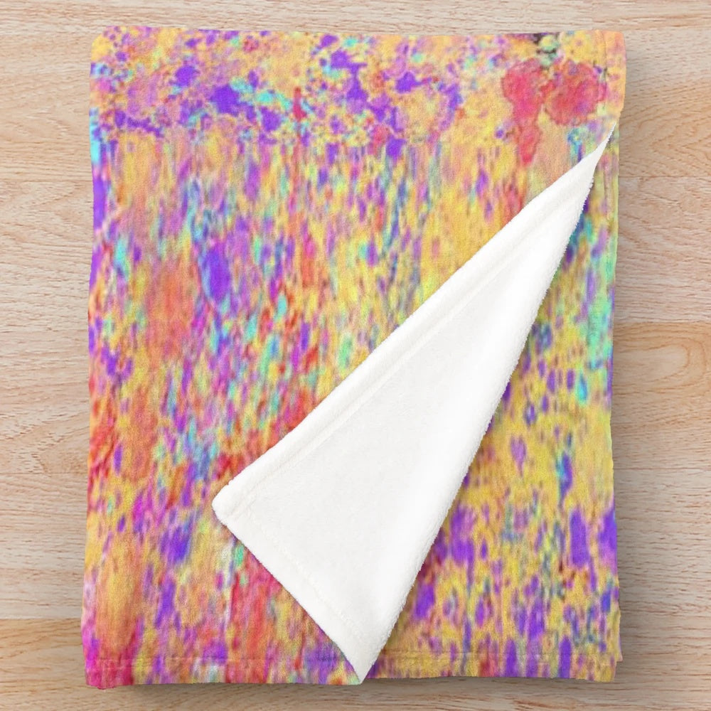 Impressionist-inspired plush blanket with vibrant colors and patterns