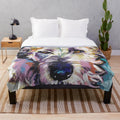 Colorful Irish Wolfhound dog portrait on a plush blanket
