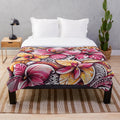 Vibrant Island-Inspired Plush Blanket featuring tropical floral and tribal patterns