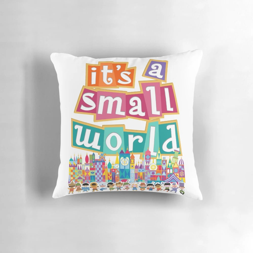 Colorful "It's a Small World" themed pillow with whimsical character designs