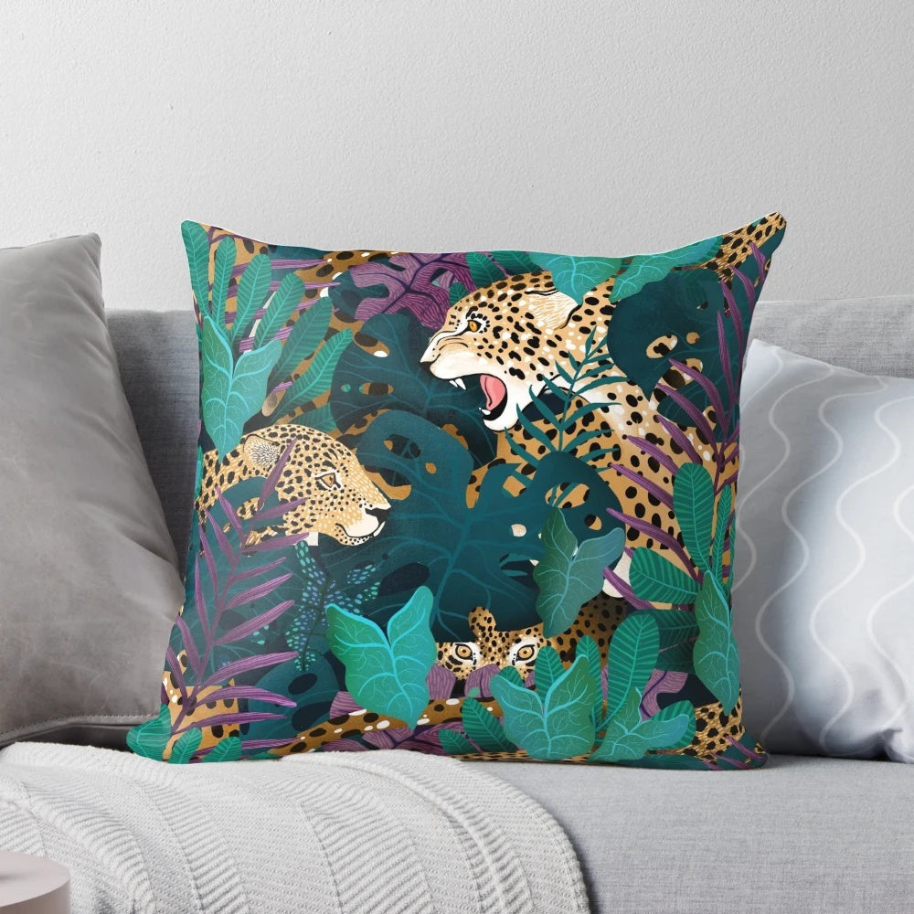 Plush jaguar-patterned pillow with lush tropical foliage design