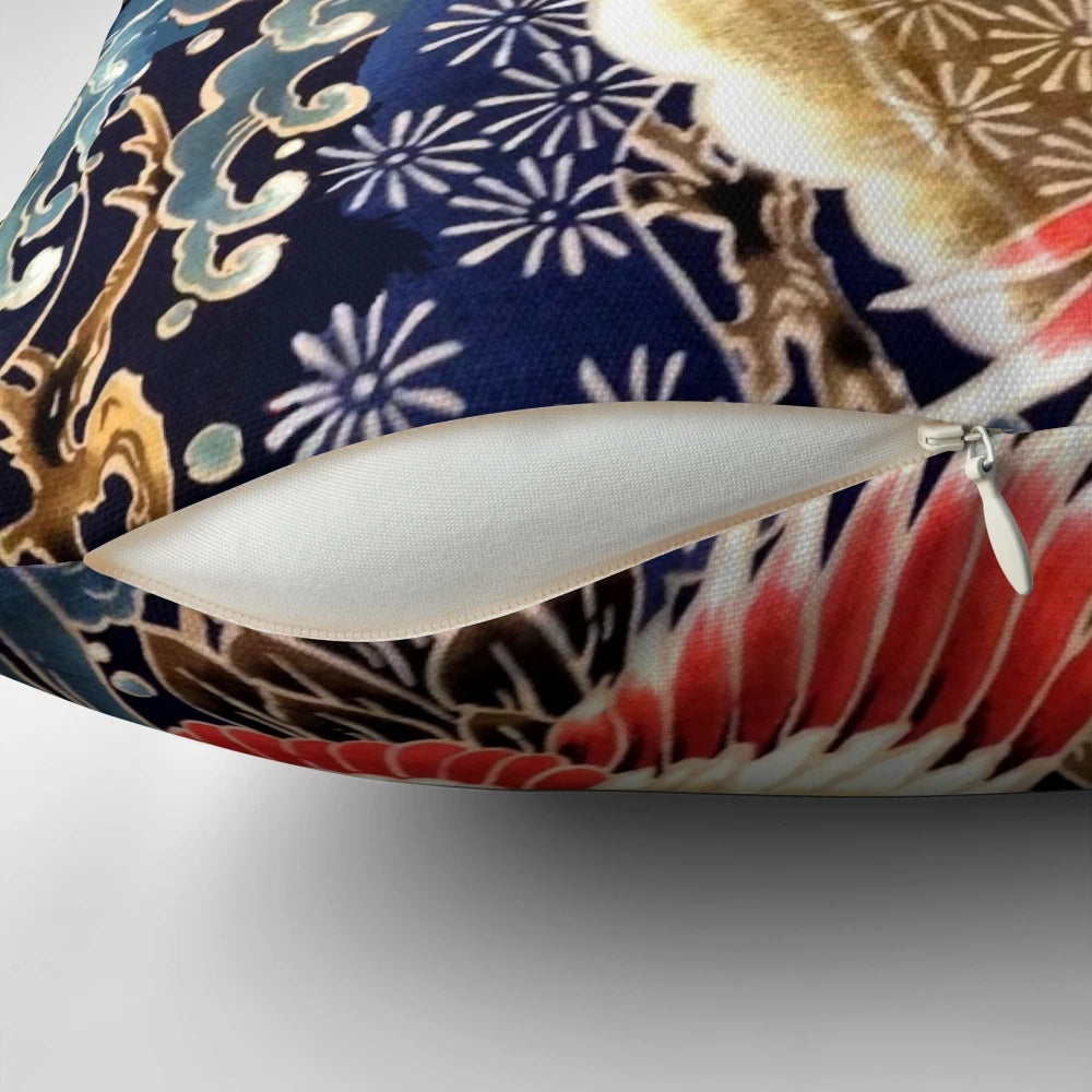 Decorative pillow featuring a vibrant Japanese-inspired design with flying cranes, floral patterns, and ocean waves in red, navy blue, and other colors.