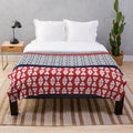 Japanese-inspired plush blanket with shibori pattern