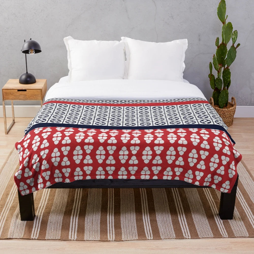Japanese-inspired plush blanket with shibori pattern