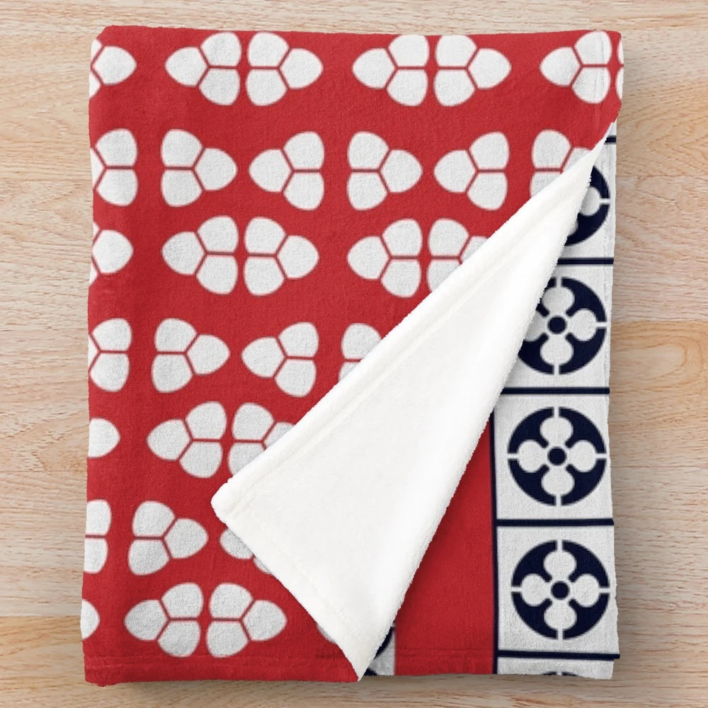 Japanese-inspired plush blanket with shibori pattern