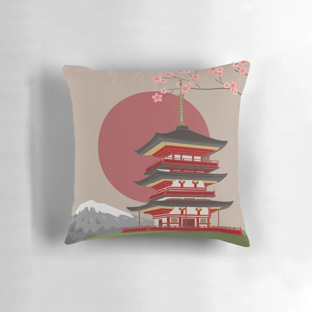 A vibrant Japanese landscape pillow featuring a traditional pagoda, Japanese architecture, and a serene sun.
