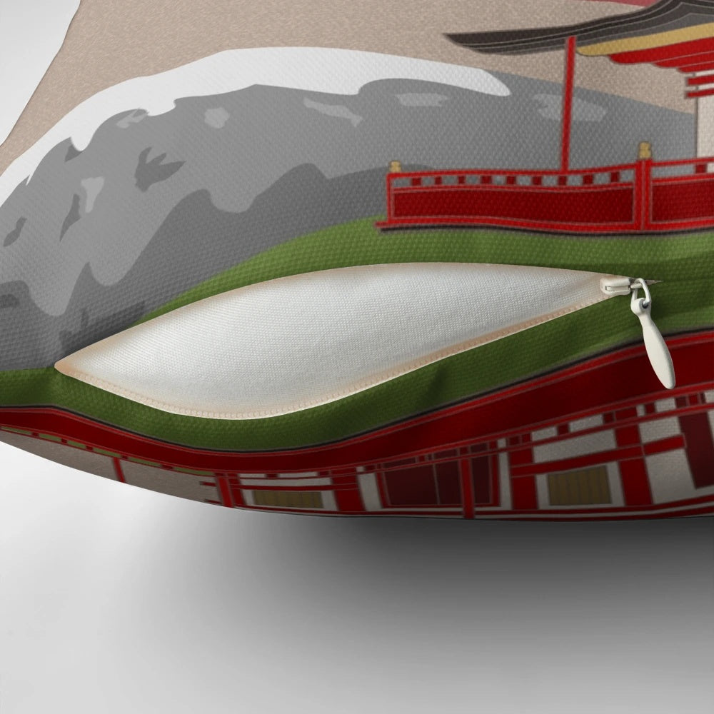 A vibrant Japanese landscape pillow featuring a traditional pagoda, Japanese architecture, and a serene sun.