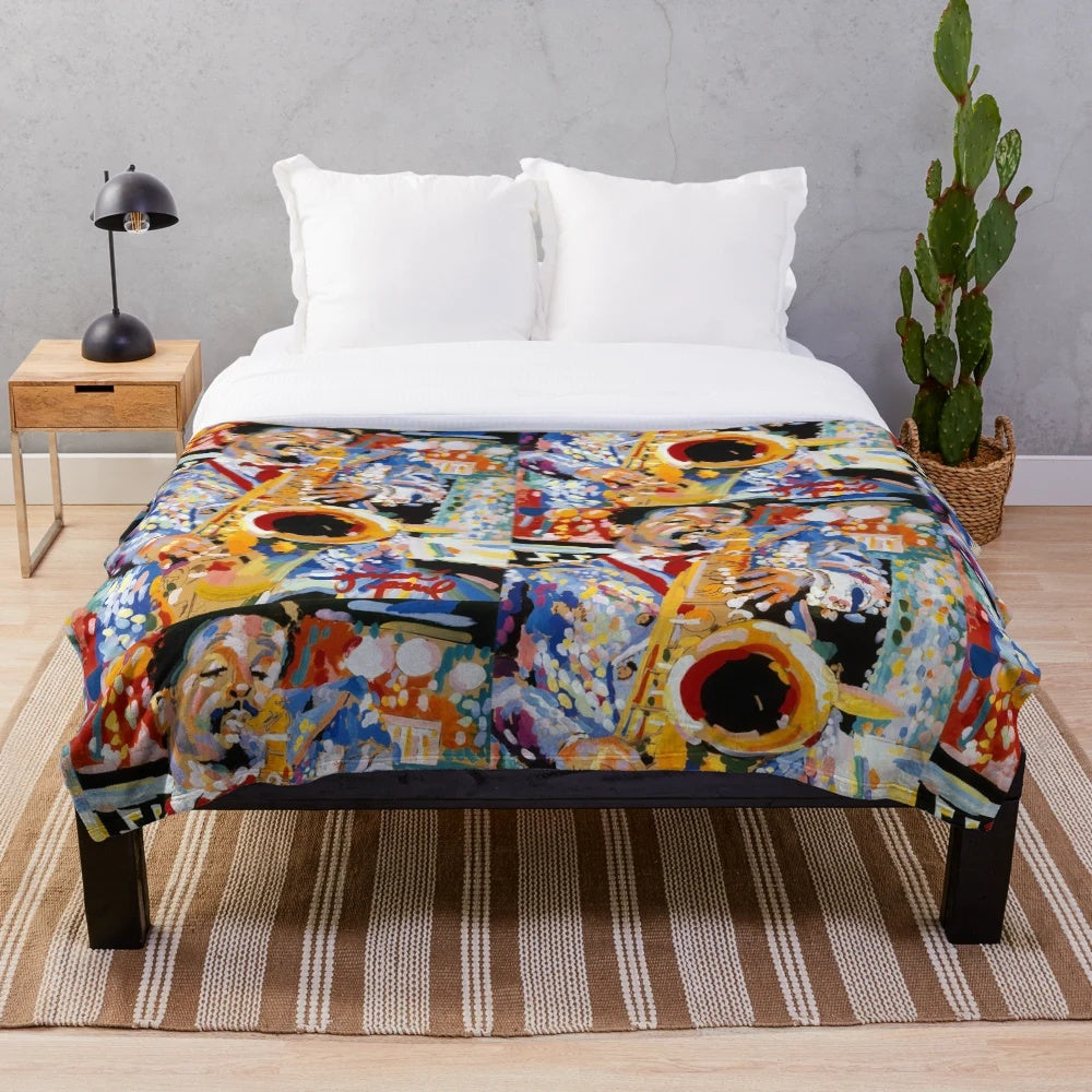 Jazz-inspired plush blanket featuring saxophone and Mardi Gras imagery